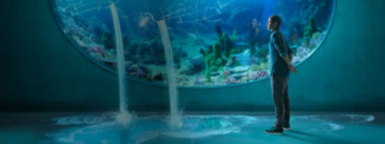 A Caucasian man peers into the cracked glass of an aquarium that has water pouring out from two places. The headline reads, “Discover Resources“.